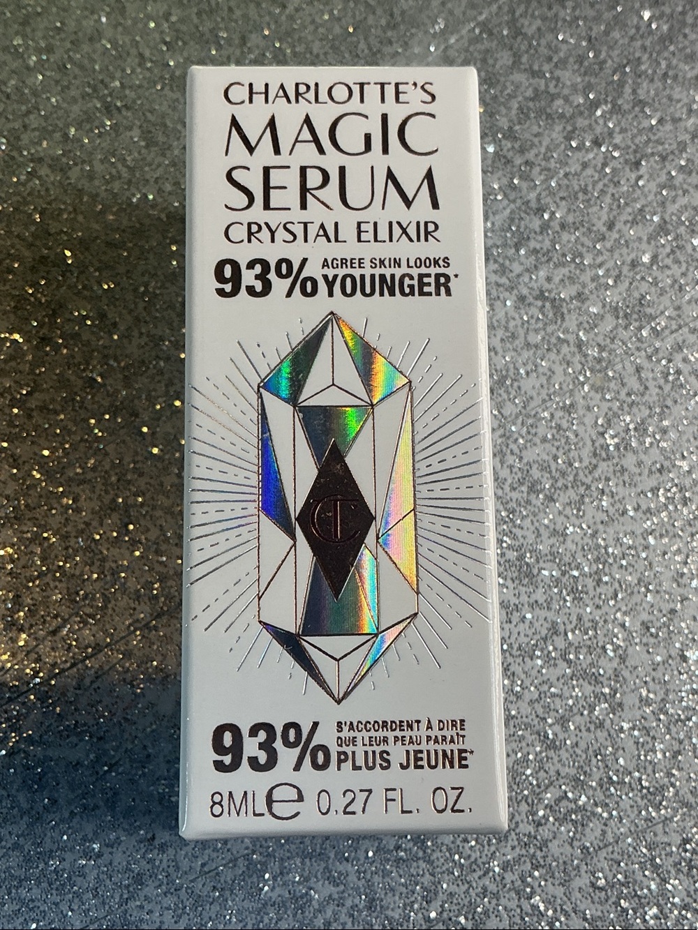 Charlotte Tilbury Magic Serum Crystal Elixir in holographic white packaging